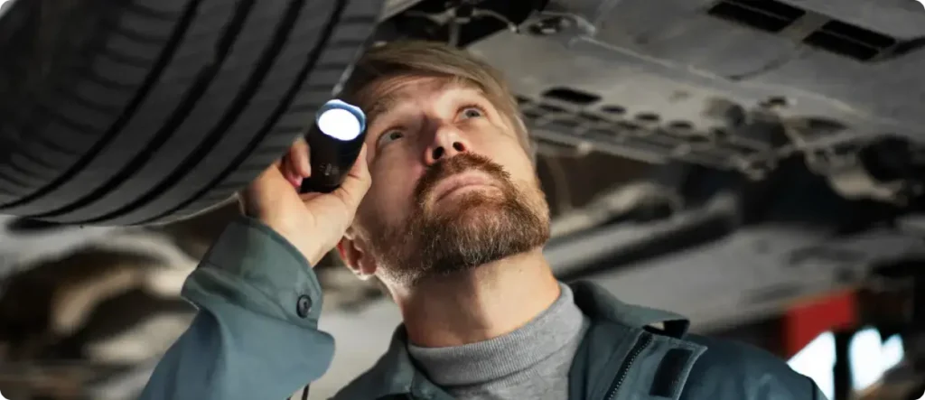 Portrait of a mechanic at work in a garage